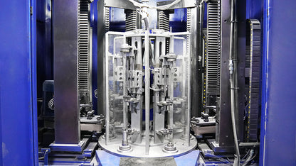 Industrial tooling press for aluminum baseball bats with multiple stations