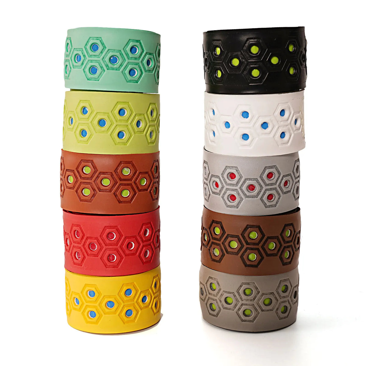 Stacked geometric baseball bat grip tape rolls in green/yellow/red and gray