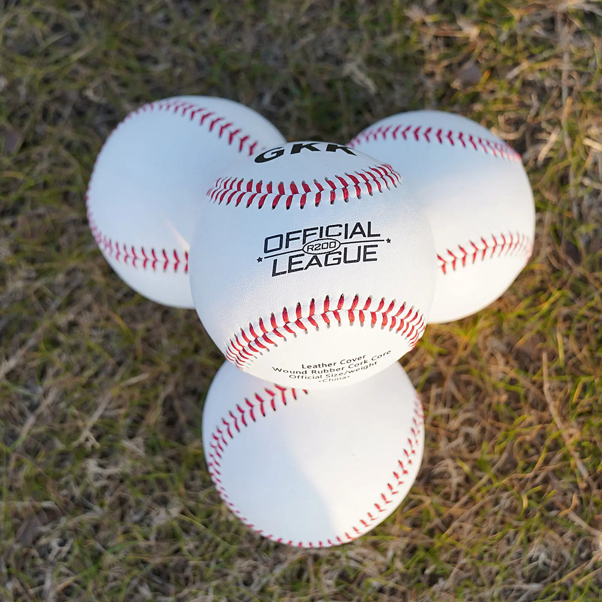 White baseball with GKK logo, OFFICIAL game league text, red stitched seams