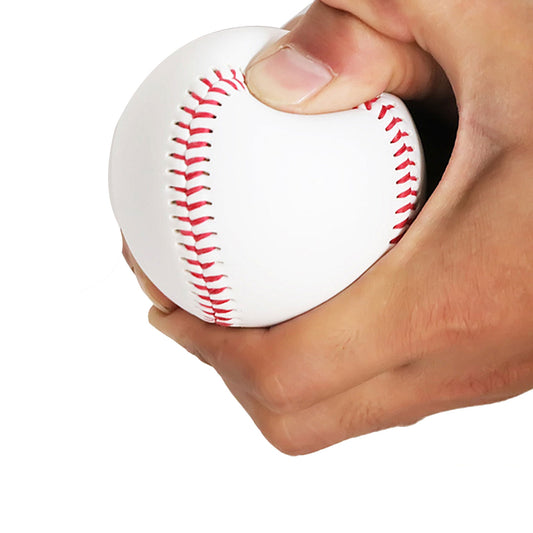 White baseball with red stitched seams held in a hand