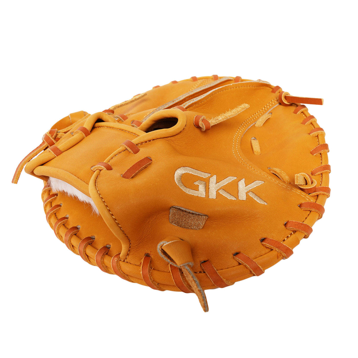 Orange leather baseball glove, side view with GK logo patch and laced trim