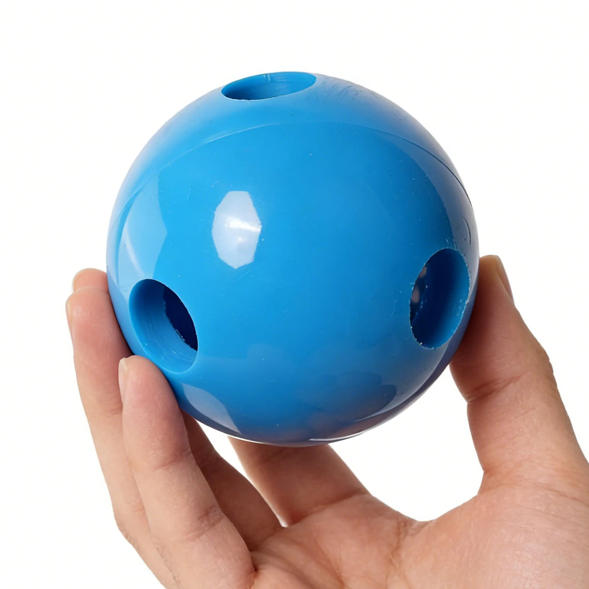 Blue PVC training ball front view with two side grip holes
