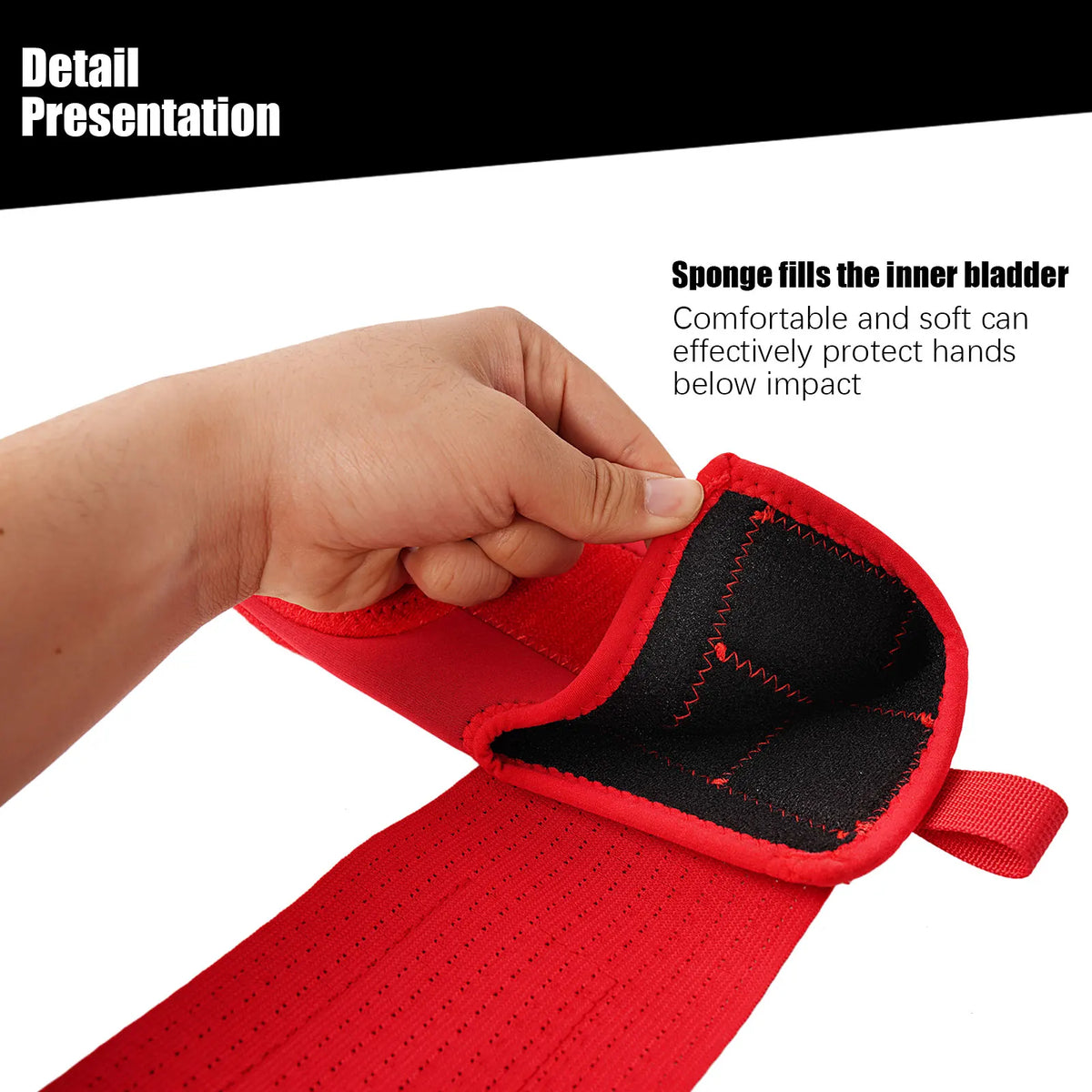 Red baseball sliding mitt with cushioned interior padding, hand pressing palm area