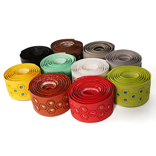 Grouped patterned baseball bat grip tape rolls in bright colors, assorted designs
